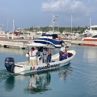 Boat leave the dock in Cozumel, Mexico.